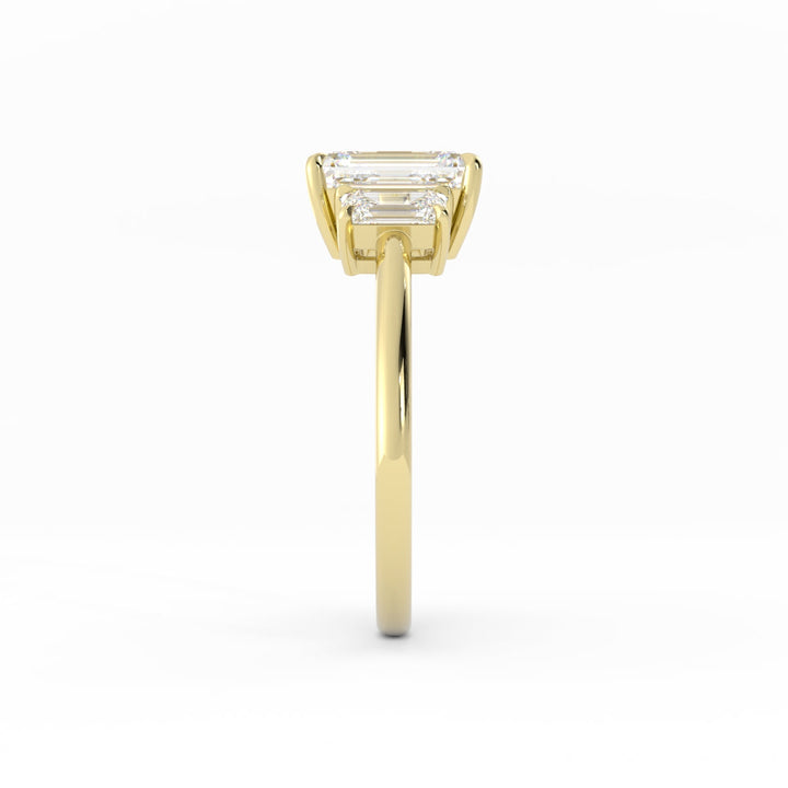 0.5ct Moissanite Emerald Cut Three Stone 10K Yellow Gold Engagement Ring