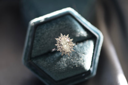 Finished platinum snowflake halo engagement ring in its Luvari presentation box